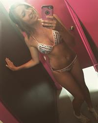 Anonymous in a bikini taking a selfie