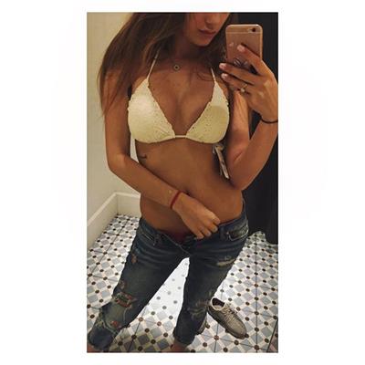 Paulina Mikolajczak in a bikini taking a selfie