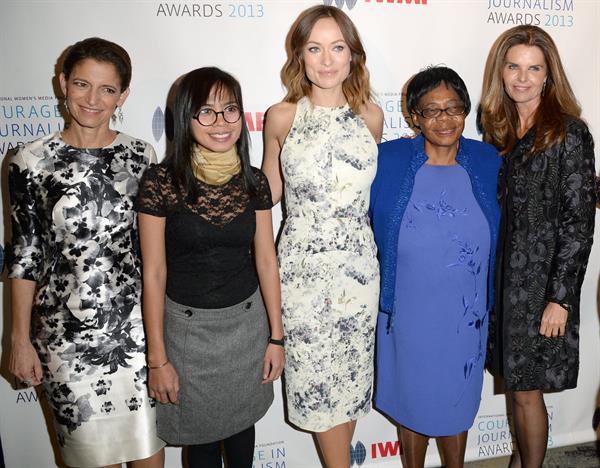 Olivia Wilde debuts her small baby bump while attending the 2013 International Women’s Media Foundation’s Courage in Journalism Awards at the Beverly Hills Hotel on Tuesday (October 29, 2013) in Beverly Hills, Calif.