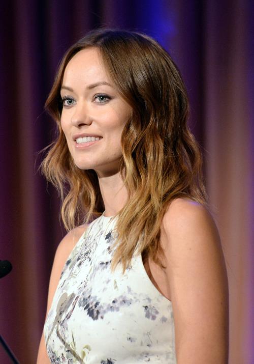 Olivia Wilde debuts her small baby bump while attending the 2013 International Women’s Media Foundation’s Courage in Journalism Awards at the Beverly Hills Hotel on Tuesday (October 29, 2013) in Beverly Hills, Calif.