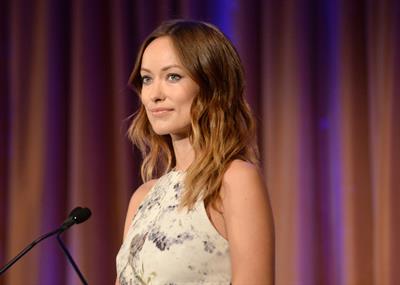Olivia Wilde debuts her small baby bump while attending the 2013 International Women’s Media Foundation’s Courage in Journalism Awards at the Beverly Hills Hotel on Tuesday (October 29, 2013) in Beverly Hills, Calif.