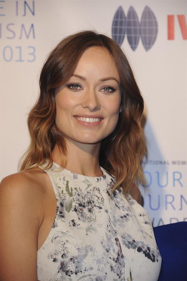 Olivia Wilde debuts her small baby bump while attending the 2013 International Women’s Media Foundation’s Courage in Journalism Awards at the Beverly Hills Hotel on Tuesday (October 29, 2013) in Beverly Hills, Calif.