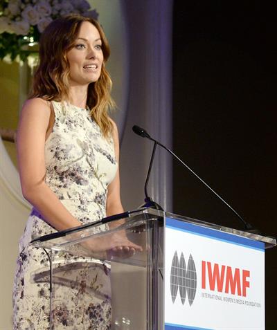 Olivia Wilde debuts her small baby bump while attending the 2013 International Women’s Media Foundation’s Courage in Journalism Awards at the Beverly Hills Hotel on Tuesday (October 29, 2013) in Beverly Hills, Calif.