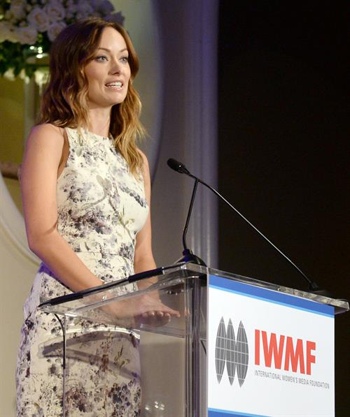 Olivia Wilde debuts her small baby bump while attending the 2013 International Women’s Media Foundation’s Courage in Journalism Awards at the Beverly Hills Hotel on Tuesday (October 29, 2013) in Beverly Hills, Calif.