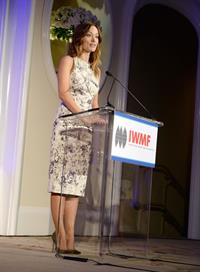 Olivia Wilde debuts her small baby bump while attending the 2013 International Women’s Media Foundation’s Courage in Journalism Awards at the Beverly Hills Hotel on Tuesday (October 29, 2013) in Beverly Hills, Calif.