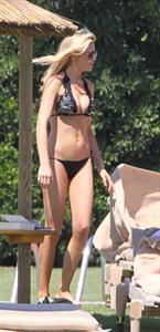 Abigail Clancy bikini candids in Italy on June 10, 2011 