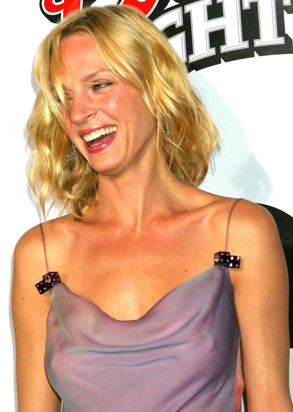 Uma Thurman in a purple dress