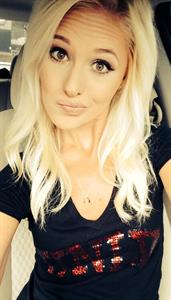 Tomi Lahren taking a selfie