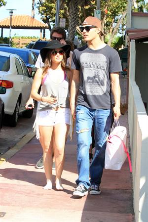 Lucy Hale and Ashley Benson photoshoot at the Bondo Bikini Shack on Miami Beach on March 24, 2012