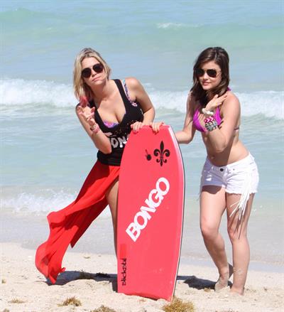 Lucy Hale and Ashley Benson photoshoot at the Bondo Bikini Shack on Miami Beach on March 24, 2012