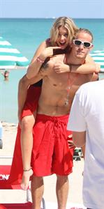 Lucy Hale and Ashley Benson photoshoot at the Bondo Bikini Shack on Miami Beach on March 24, 2012