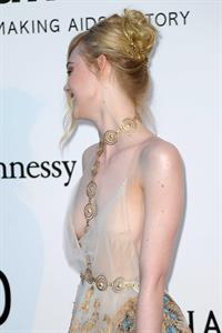 Elle Fanning showing off pasties at amfAR’s 23rd Cinema Against AIDS Gala
