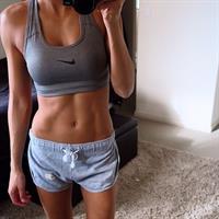 Kayla Itsines taking a selfie