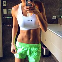 Kayla Itsines taking a selfie