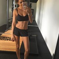 Kayla Itsines taking a selfie