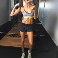 Kayla Itsines taking a selfie