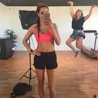 Kayla Itsines taking a selfie