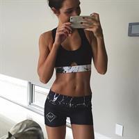 Kayla Itsines taking a selfie