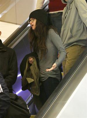 Selena Gomez arrives on a flight at Los Angeles Airport December 21, 2012 