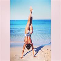 Ariela Oliveira in a bikini - ass