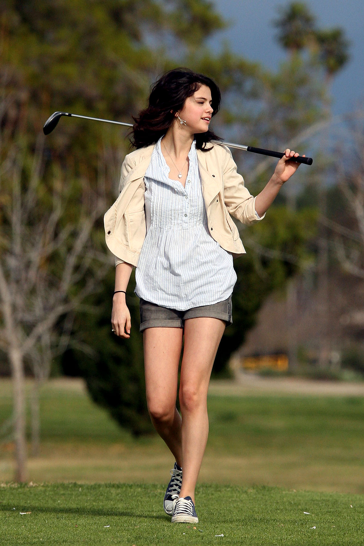 Selena Gomez golfing on February 2, 2010