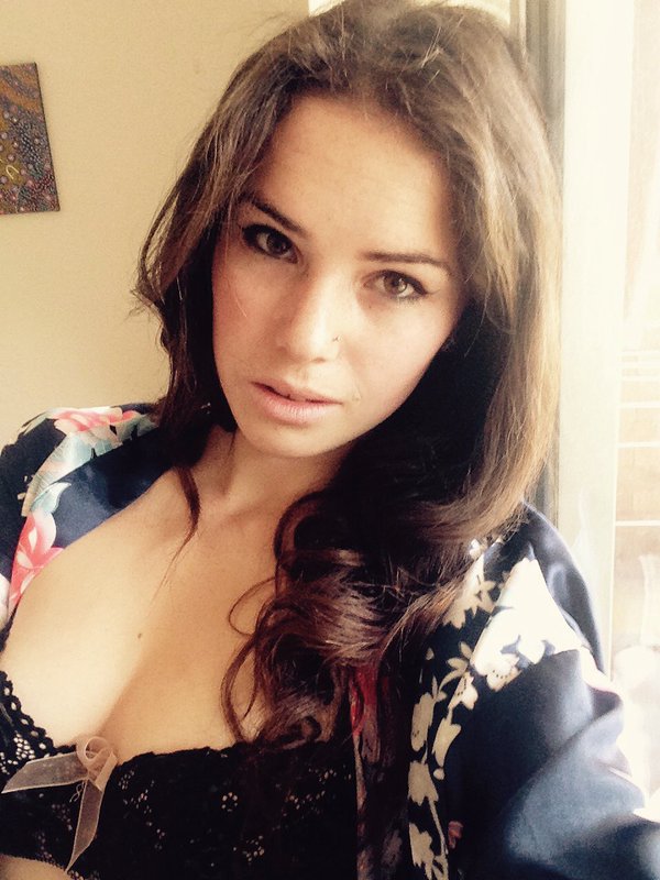 Alexis Young in lingerie taking a selfie