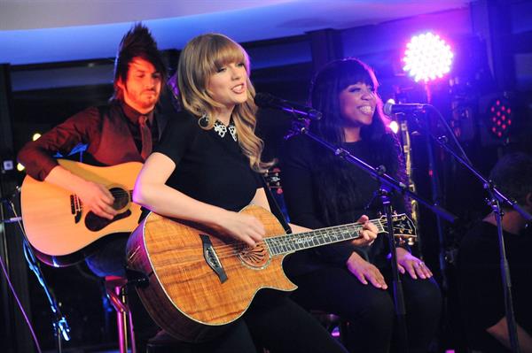 Taylor Swift performs at a private concert for NRJ on a barge on The Seine January 28, 2013 
