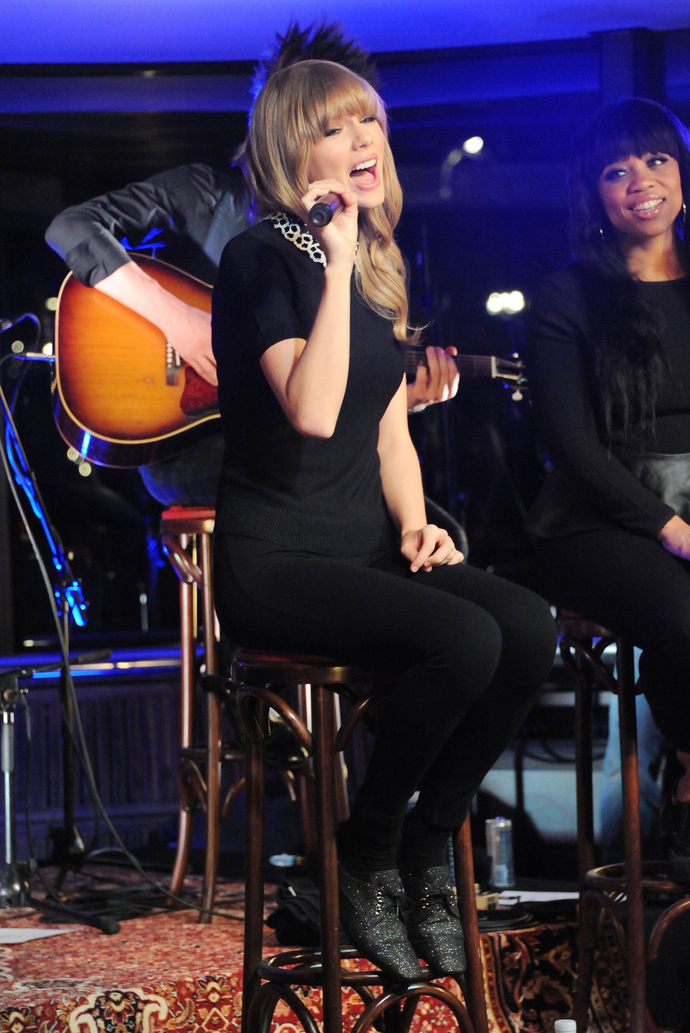 Taylor Swift performs at a private concert for NRJ on a barge on The Seine January 28, 2013 