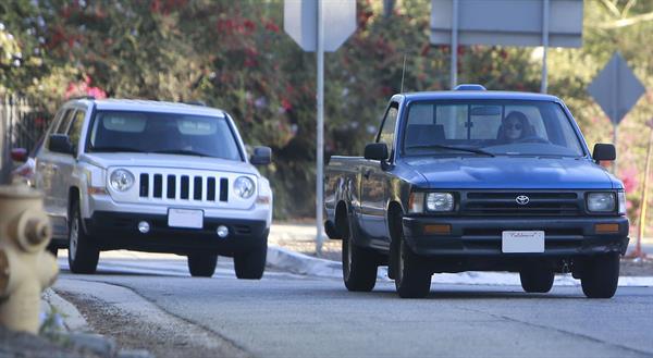 Kristen Stewart driving in Los Angeles - October 30, 2013  