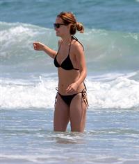 Olivia Wilde in a Bikini on the beach in Wilmington,North Carolina 8/22/12 