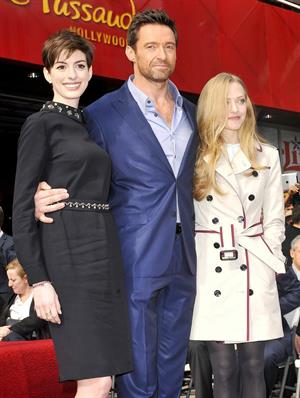 Anne Hathaway attends the Hugh Jackman Hollywood Walk Of Fame Ceremony in Hollywood December 13-2012 