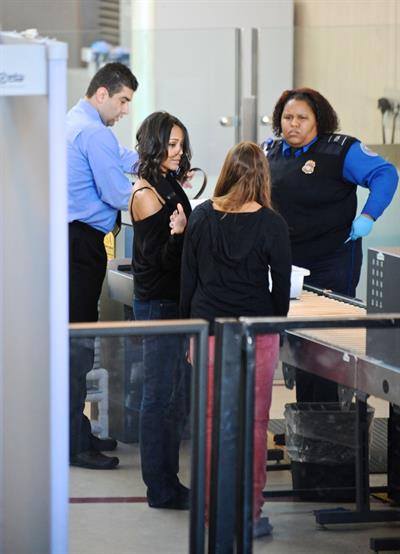 Zoe Saldana at LA Airport - February 20, 2010  