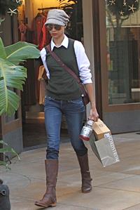 Zoe Saldana shopping at Nordstrom at The Grove in Los Angeles, CA, USA on December 24, 2011 