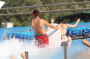 Katy Perry talks with a group of her friends after spending the afternoon at Raging Waters in San Dimas, California on August 12, 2012