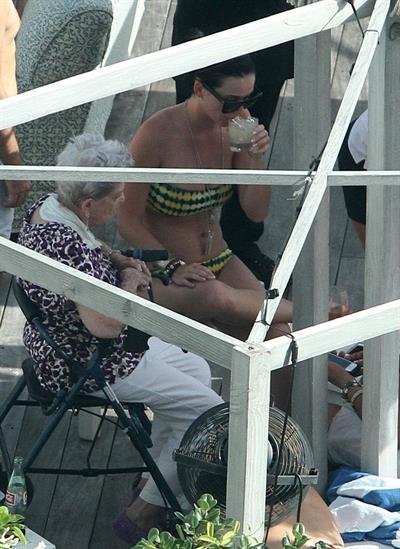 Katy Perry - In a bikini at a hotel pool in Miami July 27, 2012