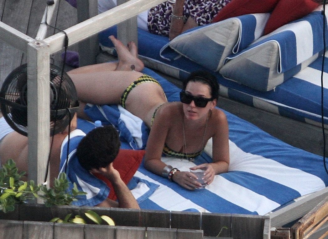 Katy Perry - In a bikini at a hotel pool in Miami July 27, 2012