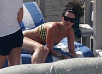 Katy Perry - In a bikini at a hotel pool in Miami July 27, 2012
