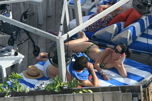 Katy Perry - In a bikini at a hotel pool in Miami July 27, 2012