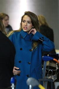 Jessica Alba arrives at Charles de Gaulle Airport in Paris 3/1/13 