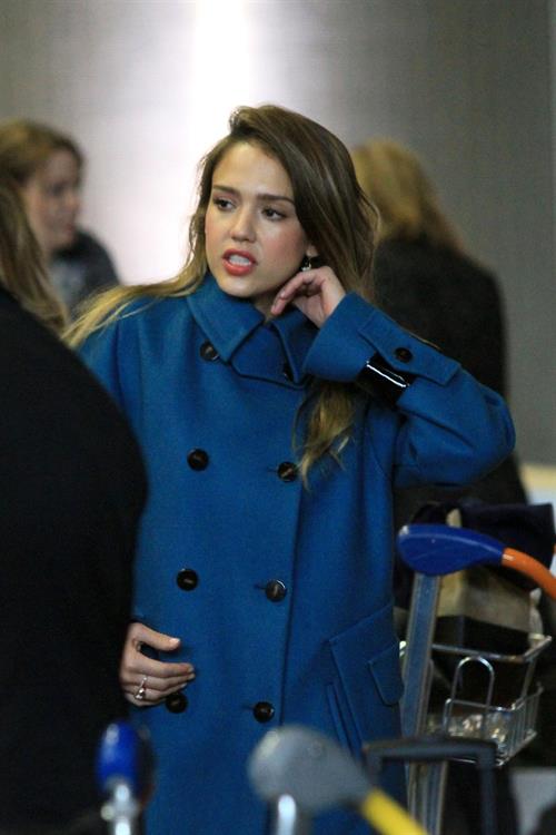Jessica Alba arrives at Charles de Gaulle Airport in Paris 3/1/13 