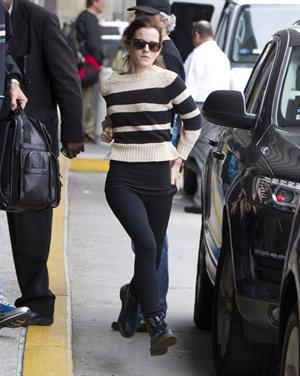 Emma Watson ...at JFK airport in NYC Sept 29, 2012 