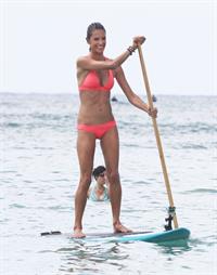 Alessandra Ambrosio paddleboarding in bikinis in Honolulu on October 12, 2011