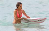 Alessandra Ambrosio paddleboarding in bikinis in Honolulu on October 12, 2011