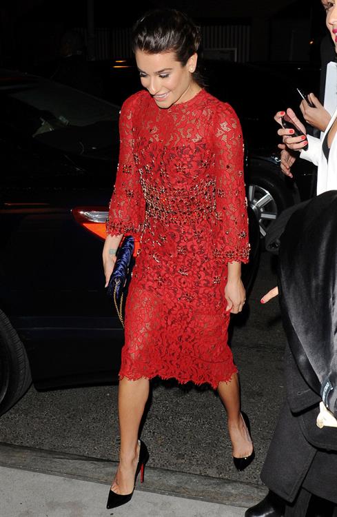 Lea Michele outside in a red dress at night