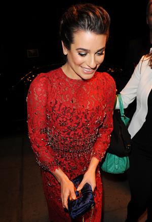Lea Michele outside in a red dress at night