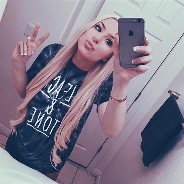 Tana Mongeau taking a selfie