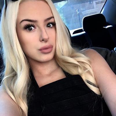 Tana Mongeau taking a selfie