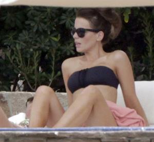 Kate Beckinsale in bikini as she fits in some sunbathing on family holiday in Mexico March 28-2013 
