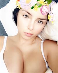 Demi Rose Mawby taking a selfie