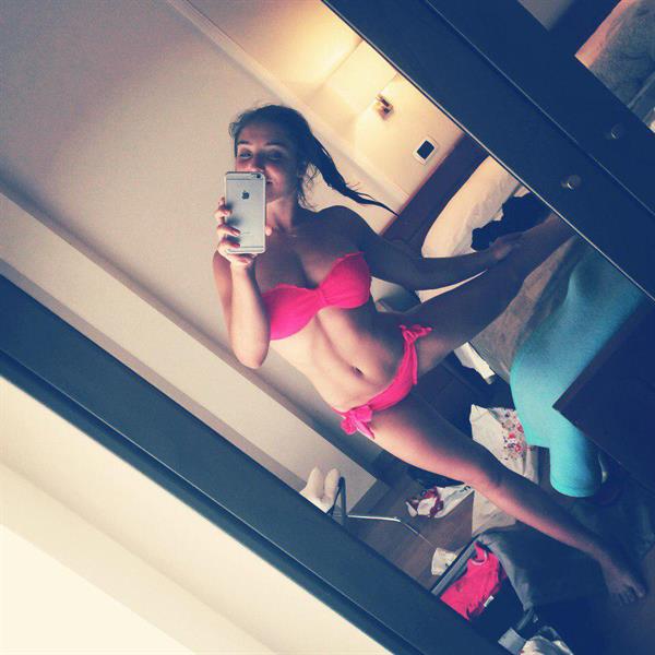 Aliya Mustafina in a bikini taking a selfie